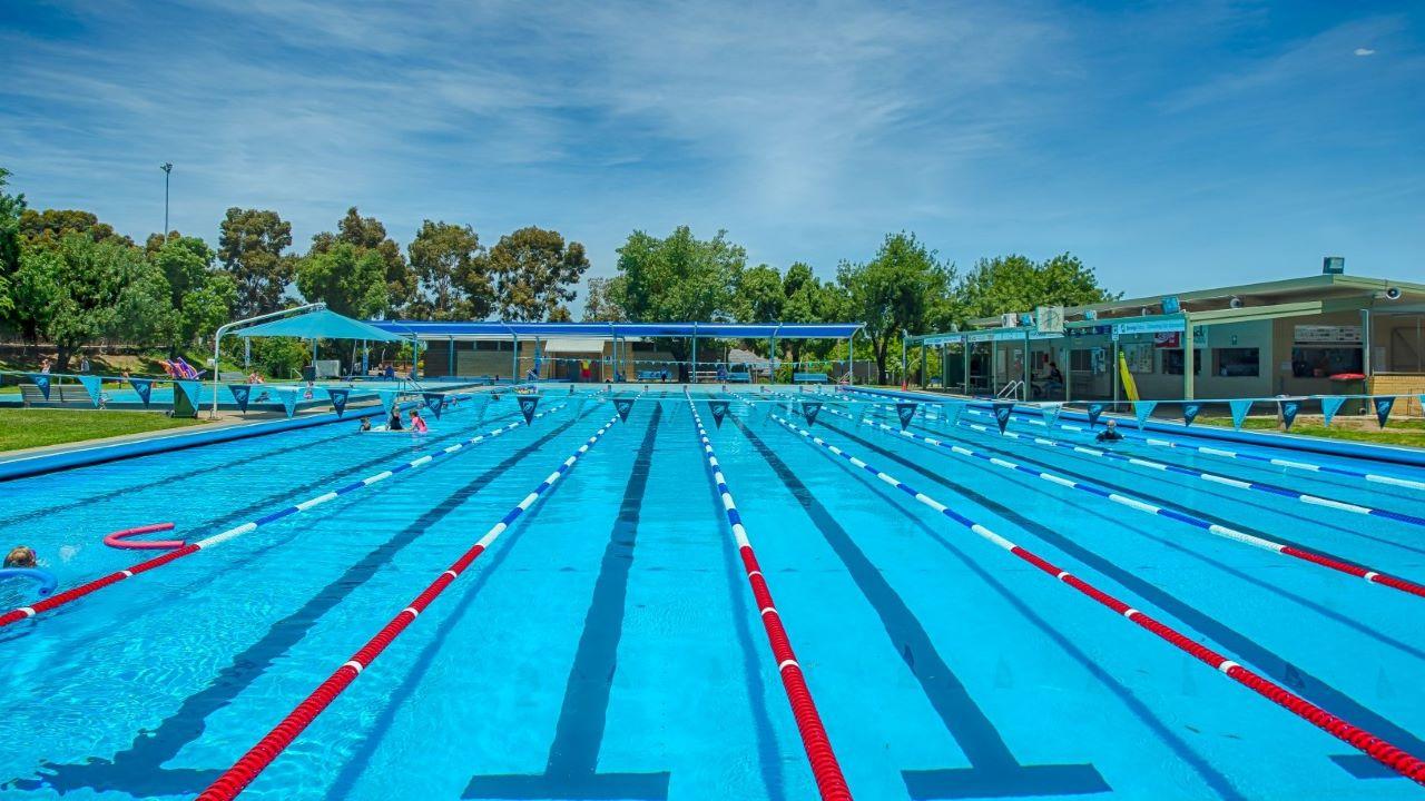 A sunny day at Bendigo East Pool, with the lap lanes in the foreground.