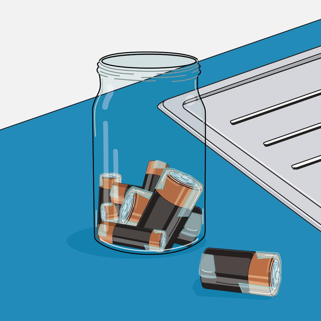Batteries stored in open glass jar