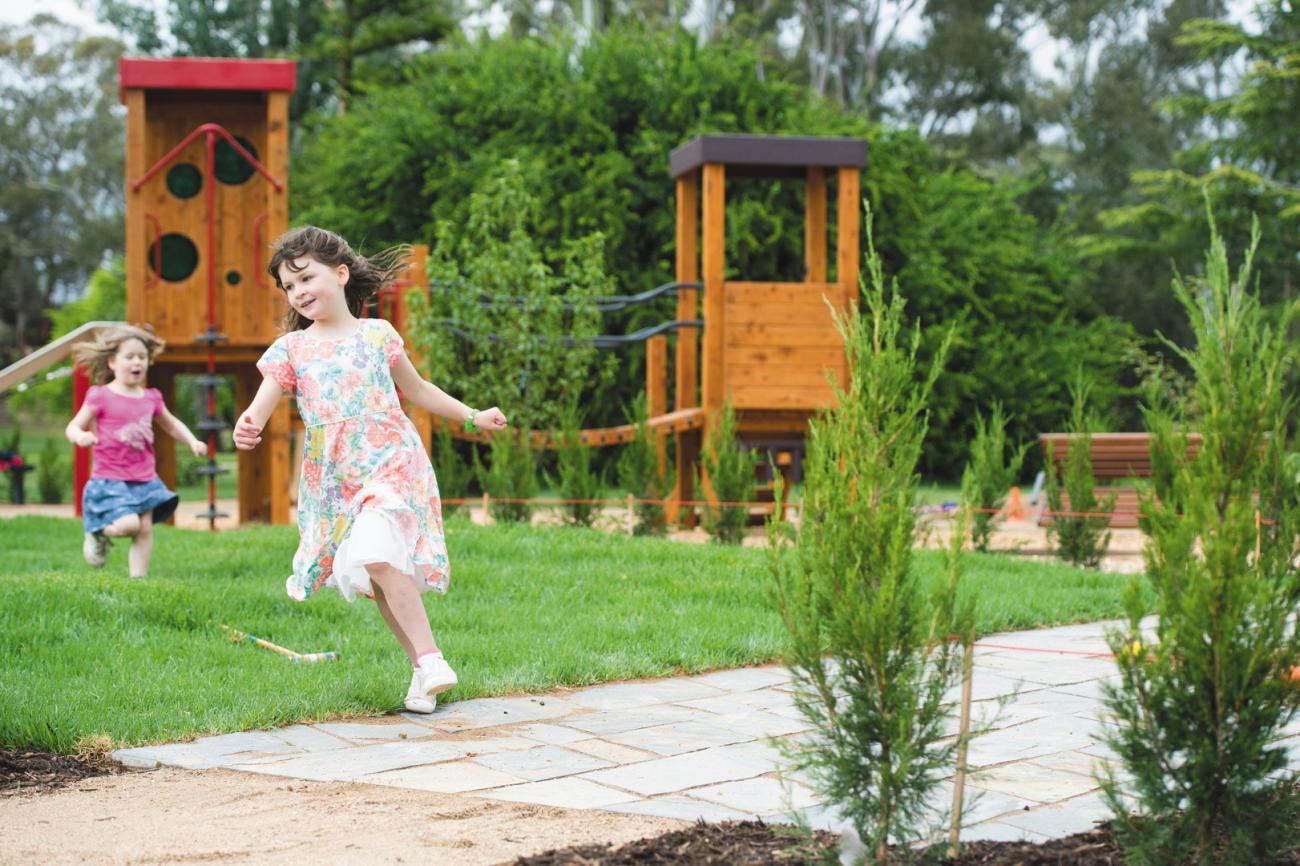 Girls running at Botanic Gardens play space