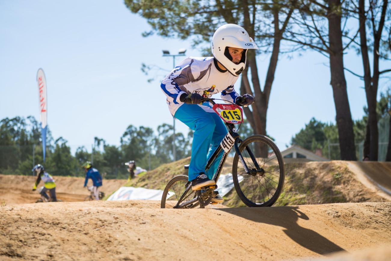 Kid on BMX bike with helmet