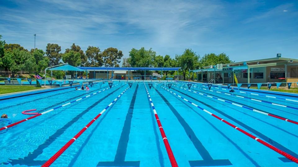 A sunny day at Bendigo East Pool, with the lap lanes in the foreground.