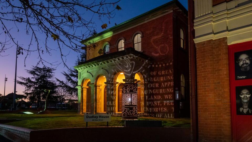 Dudley House at night - Acknowledgement of Country sculpture by Isobel Morphy-Walsh.