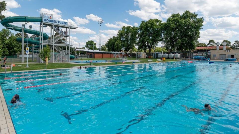 People enjoying a swim in the 50m pool at Faith Leech Aquatic Centre.