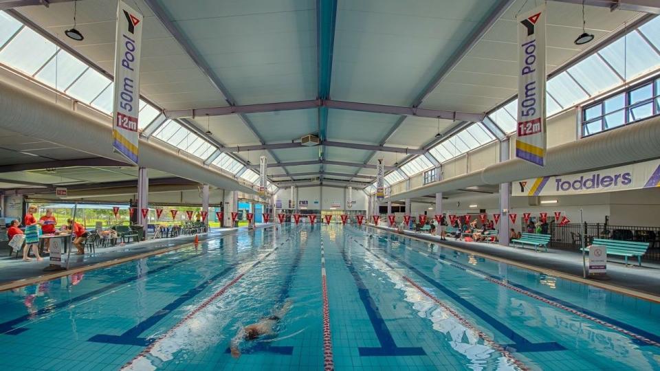 People swimming laps in the indoor pool at Peter Krenz Leisure Centre.