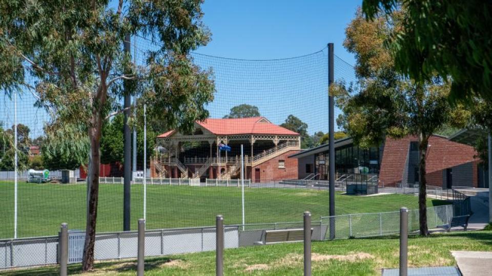 Pavilion and goals at Canterbury Park Oval