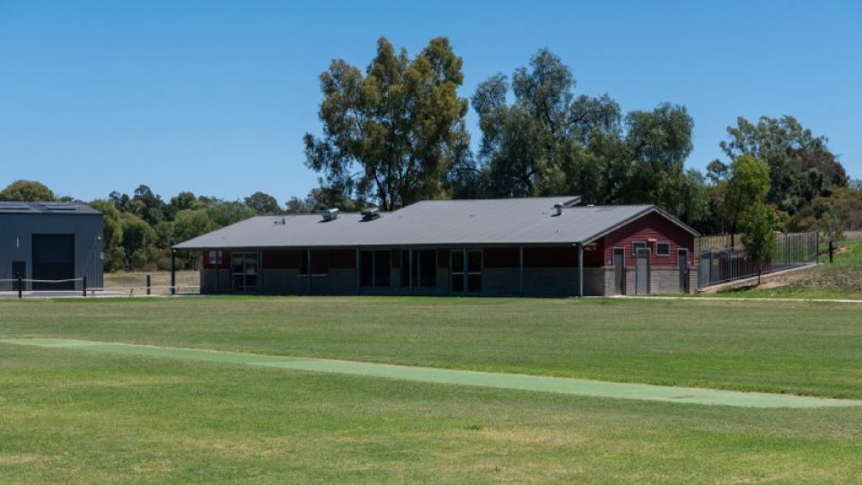 Building and cricket pitch at Long Gully Recreation Reserve