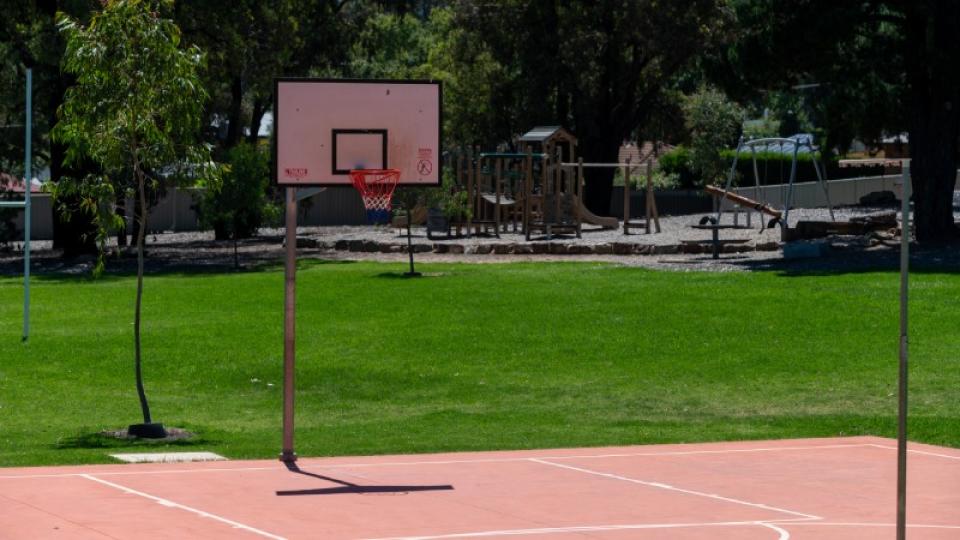 Basketball court and hoop at Ross Park playspace