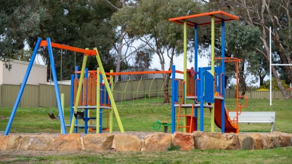 Play equipment and seat at Maxwell Drive Playspace