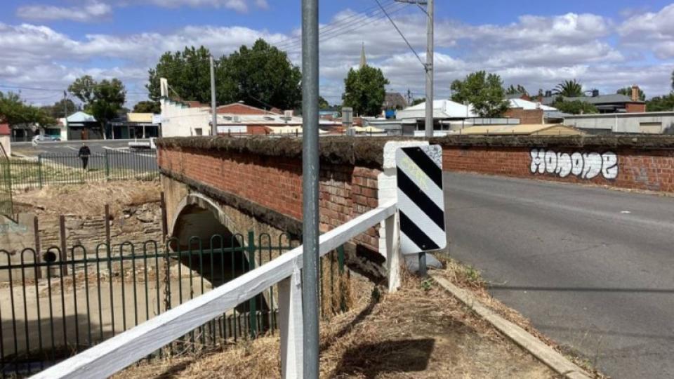 Picture of Booth Street Bridge taken from the road.