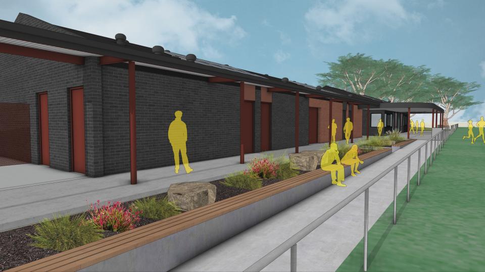 Image showing the seating next to a grassed area outside the pavilion.