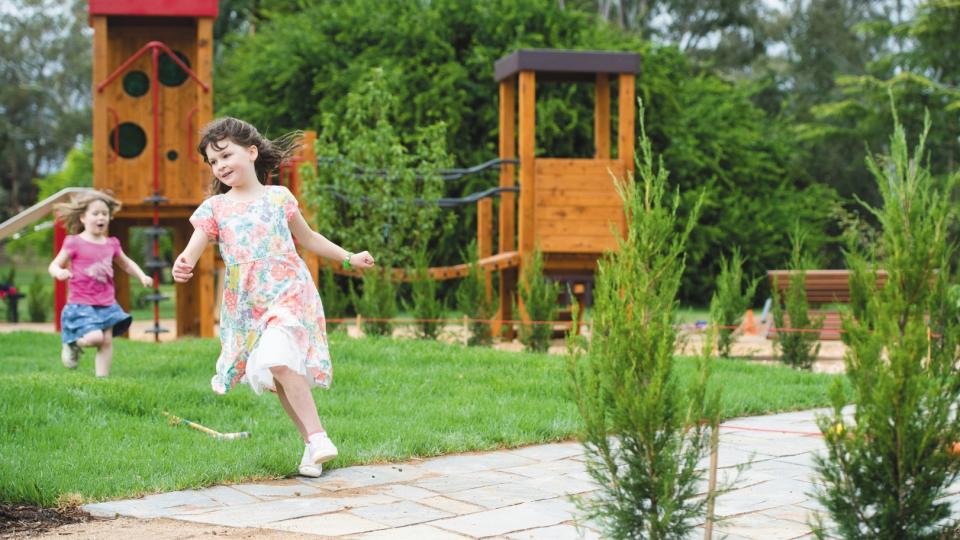 Girls running at Botanic Gardens play space