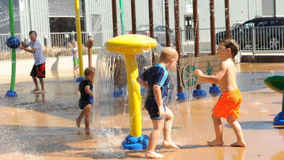 Kids Playing in Water at Splash Park